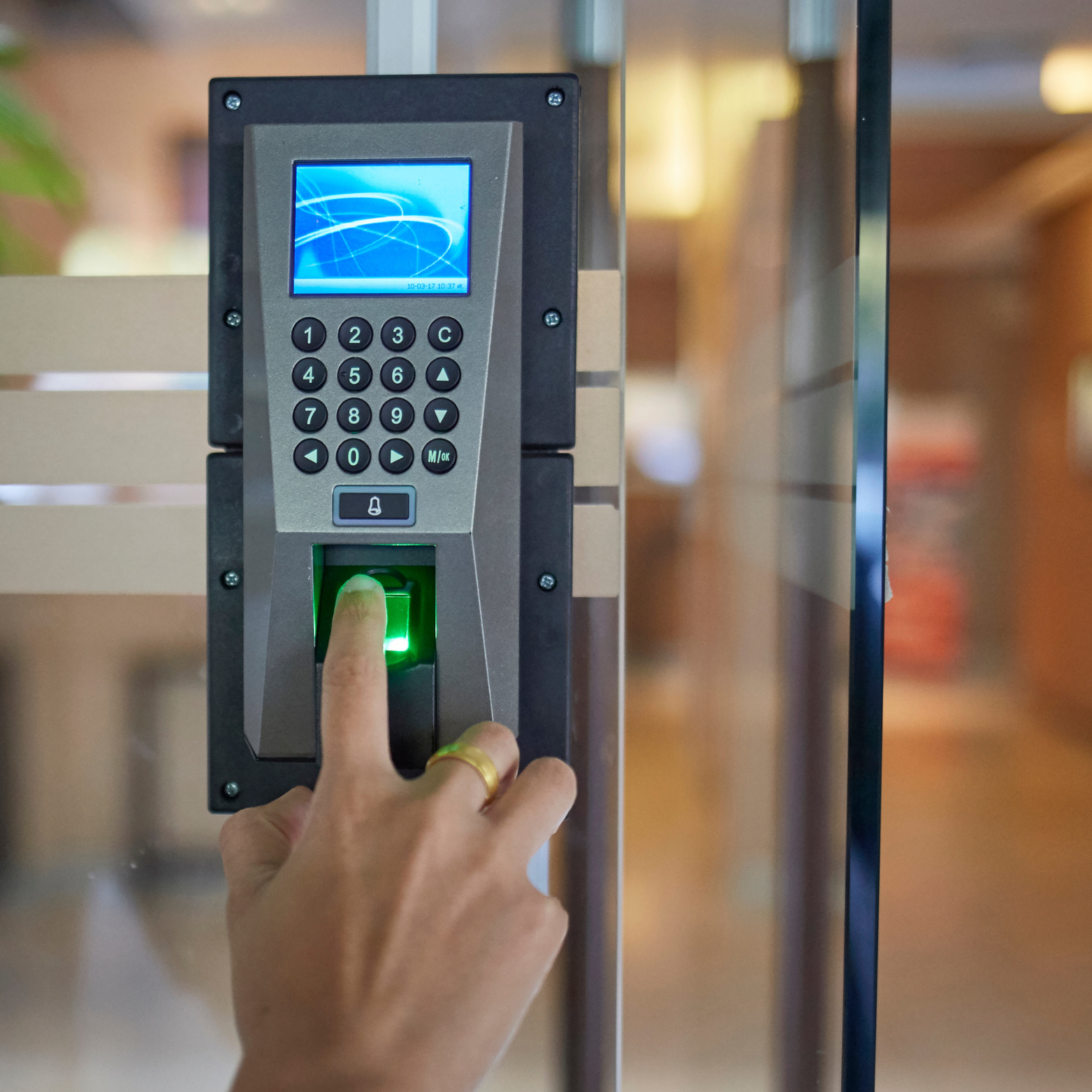 Hand scanning finger on Biometric Access Panel